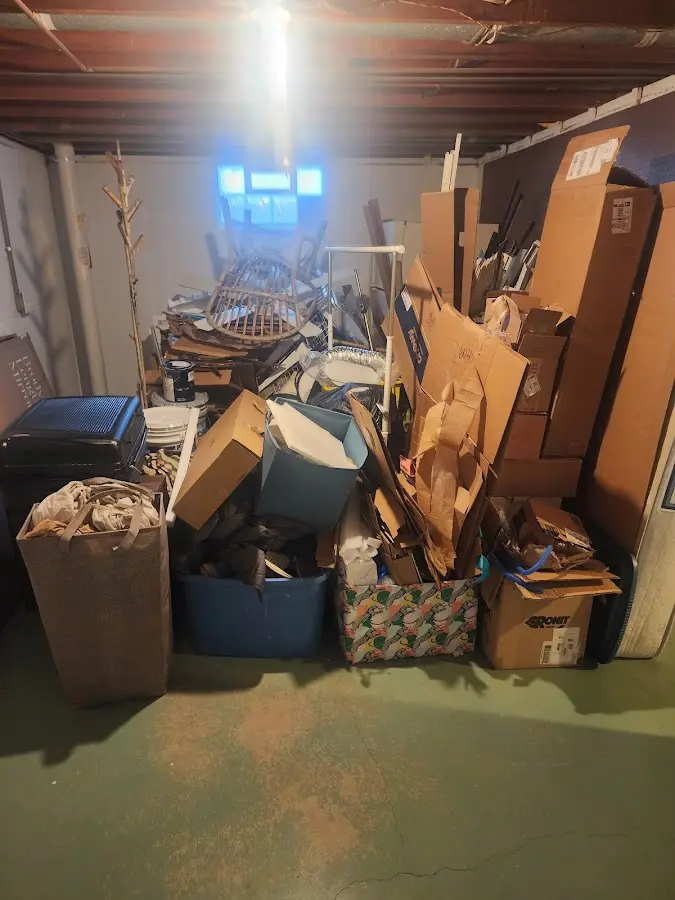 Roll-off dumpster container at job site for 6 Yard Dumpster Rental in Stevensville